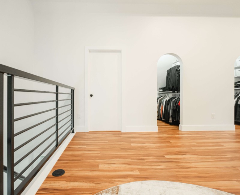 The owners of a 1950s ranch in Madison, WI wanted to transform their unfinished attic into a fully finished second floor with a primary bedroom retreat, ensuite bath, and plenty of closet space.
