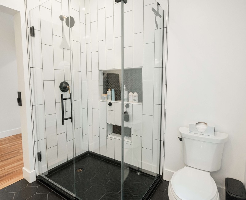 The owners of a 1950s ranch in Madison, WI wanted to transform their unfinished attic into a fully finished second floor with a primary bedroom retreat, ensuite bath, and plenty of closet space.