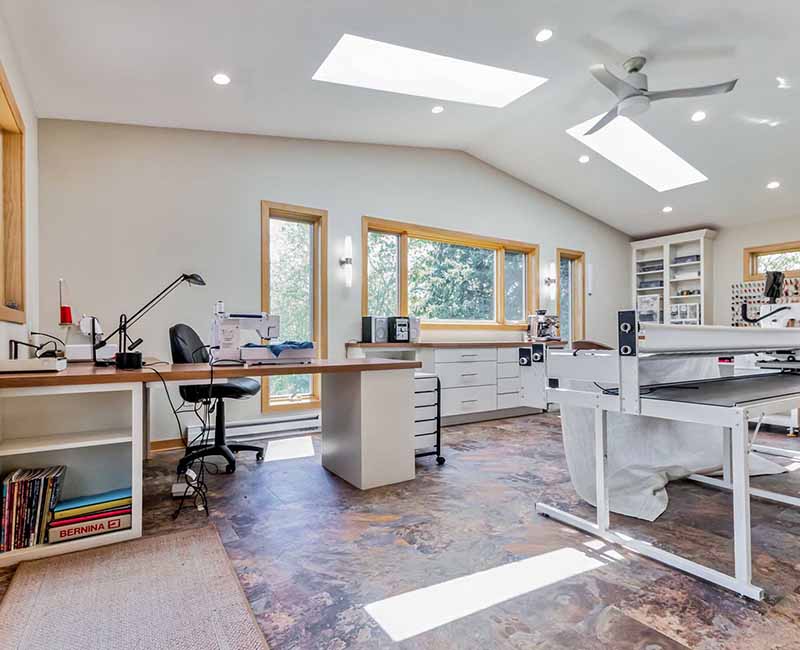 This home addition in Middleton, WI provided the homeowner with a quilting and craft room that has incredible views of the backyard and that opens out onto a fully remodeled deck.