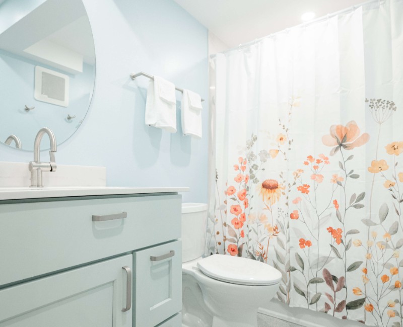 A basement remodel in Madison, WI that transformed an unfinished basement into a rec room, complete with a private full bath. The layout gives the kids a place that’s entirely their own: room to run around, play with toys, and sleep. 
