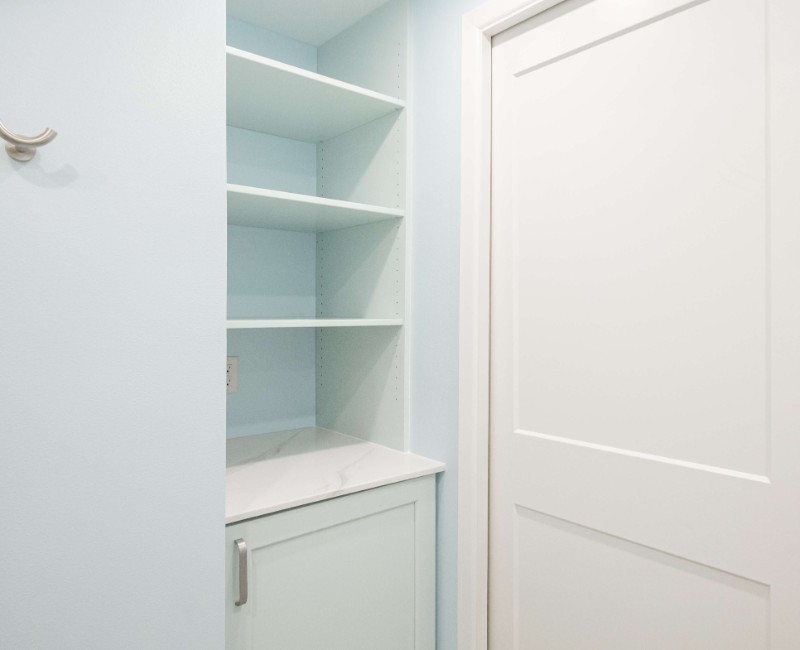 A basement remodel in Madison, WI that transformed an unfinished basement into a rec room, complete with a private full bath. The layout gives the kids a place that’s entirely their own: room to run around, play with toys, and sleep. 