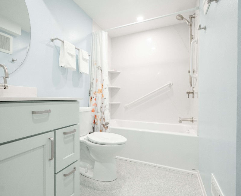 A basement remodel in Madison, WI that transformed an unfinished basement into a rec room, complete with a private full bath. The layout gives the kids a place that’s entirely their own: room to run around, play with toys, and sleep. 