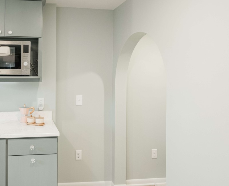 This basement remodel was part of a full basement and kitchen renovation in Madison, WI. Our design-build team transformed an outdated basement into a spacious rec room with wet bar and fridge, a den or office area, and a full bathroom. 