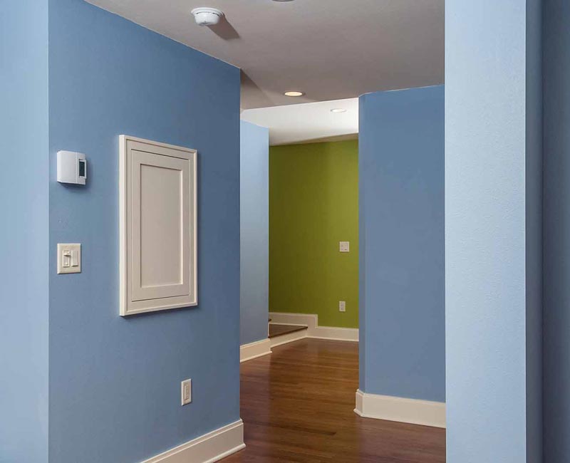 We transformed a formerly damp and dark basement in Madison, WI, into a fun and functional recreation space that is comfortable and bright.