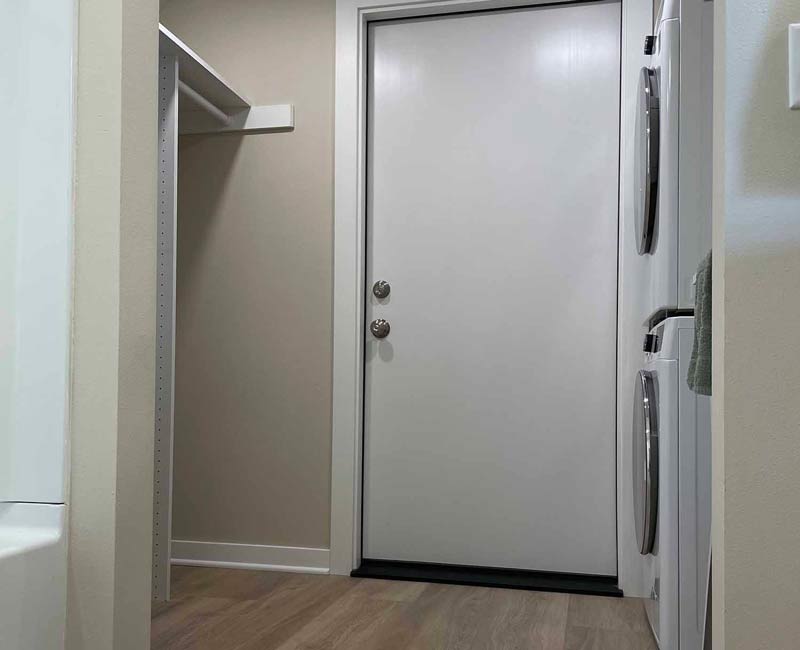 We remodeled this basement in Madison, WI, into a spacious, yet efficient, apartment that is full of natural light and lots of storage.