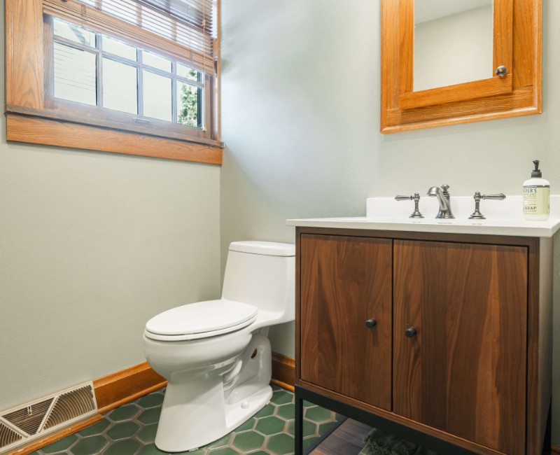 These two bathroom remodels are part of a larger whole-home renovation in Madison's Nakoma neighborhood, using unique tile in both spaces that brought our client's creative vision to life.