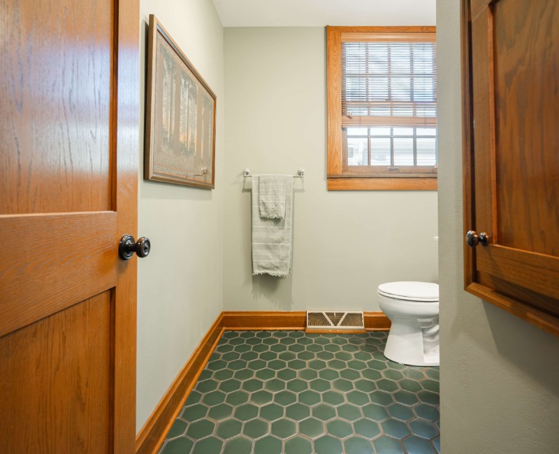These two bathroom remodels are part of a larger whole-home renovation in Madison's Nakoma neighborhood, using unique tile in both spaces that brought our client's creative vision to life.