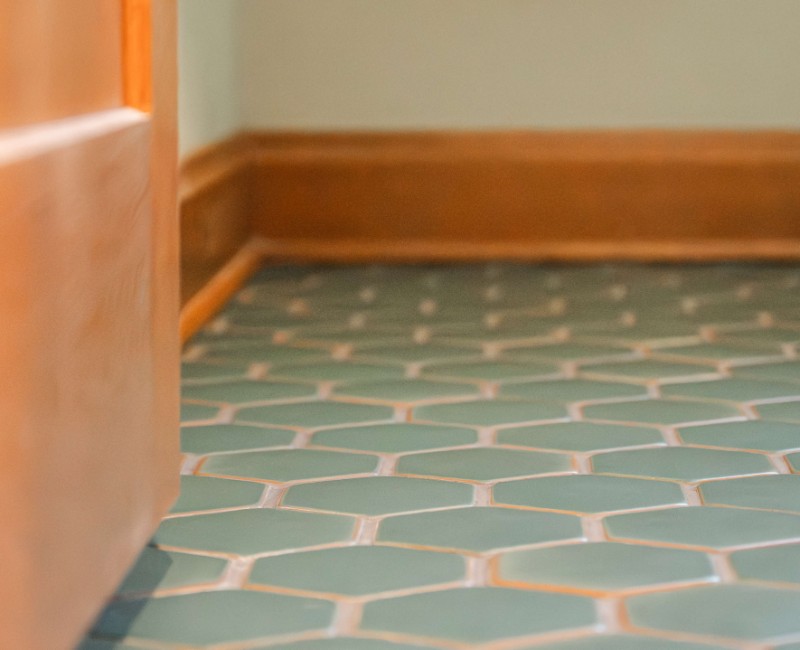 These two bathroom remodels are part of a larger whole-home renovation in Madison's Nakoma neighborhood, using unique tile in both spaces that brought our client's creative vision to life.