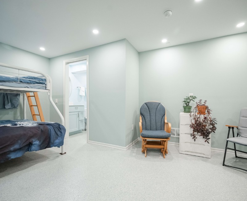 This bathroom remodel is part of a basement renovation in a Madison, WI home. A private full bathroom just off the newly remodeled rec room, complete with a soaking tub and shower. 