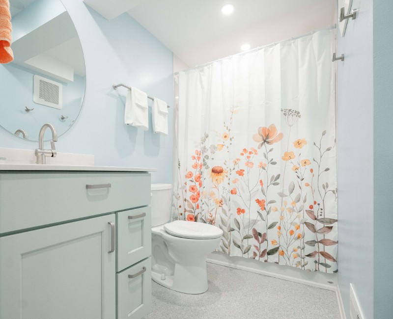 This bathroom remodel is part of a basement renovation in a Madison, WI home. A private full bathroom just off the newly remodeled rec room, complete with a soaking tub and shower. 