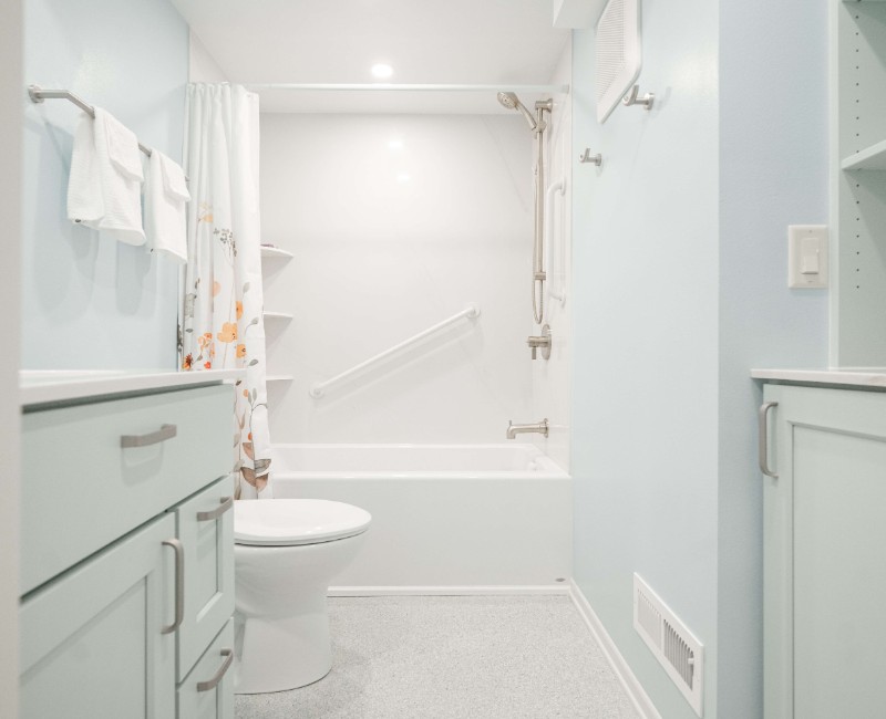 This bathroom remodel is part of a basement renovation in a Madison, WI home. A private full bathroom just off the newly remodeled rec room, complete with a soaking tub and shower. 