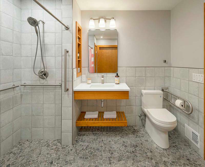 This award-winning bathroom remodel in Madison, WI was designed to meet the accessibility needs of the homeowner’s daughter and to allow the homeowners to age in place through universal design.