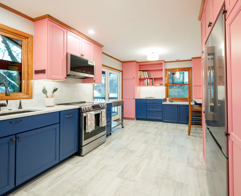 A kitchen gut and remodel in Madison that features a bold color palette and tons of storage. 