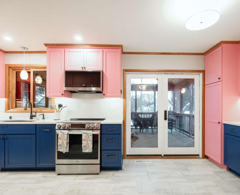 A kitchen gut and remodel in Madison that features a bold color palette and tons of storage. 