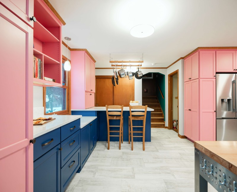 A kitchen gut and remodel in Madison that features a bold color palette and tons of storage. 