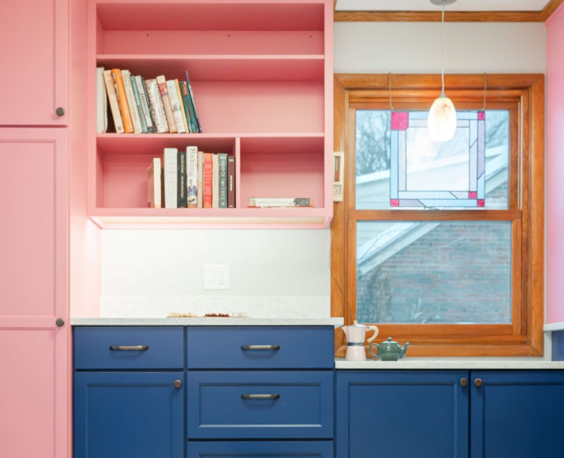 A kitchen gut and remodel in Madison that features a bold color palette and tons of storage. 