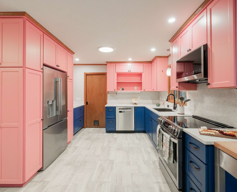 A kitchen gut and remodel in Madison that features a bold color palette and tons of storage. 