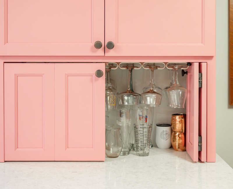 A kitchen gut and remodel in Madison that features a bold color palette and tons of storage. 