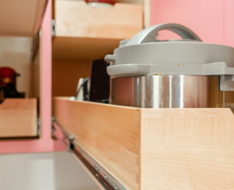 A kitchen gut and remodel in Madison that features a bold color palette and tons of storage. 