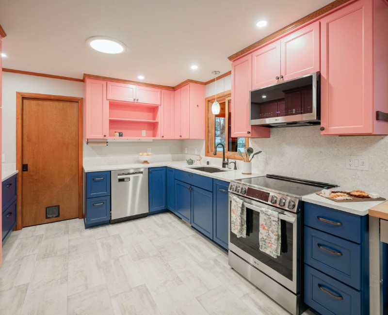 A kitchen gut and remodel in Madison that features a bold color palette and tons of storage. 