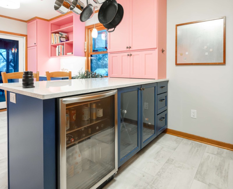 A kitchen gut and remodel in Madison that features a bold color palette and tons of storage. 