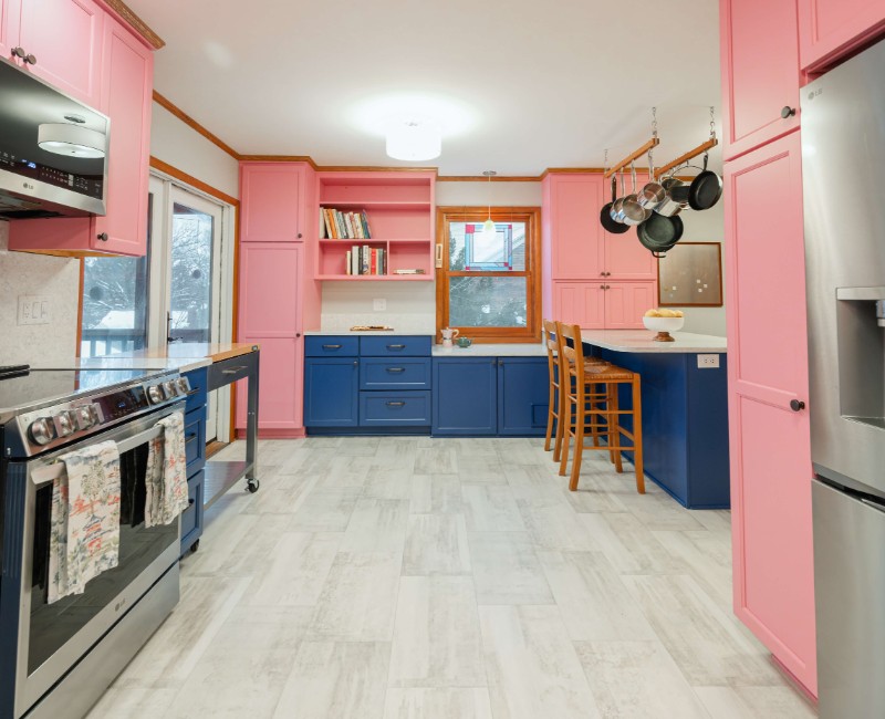A kitchen gut and remodel in Madison that features a bold color palette and tons of storage. 