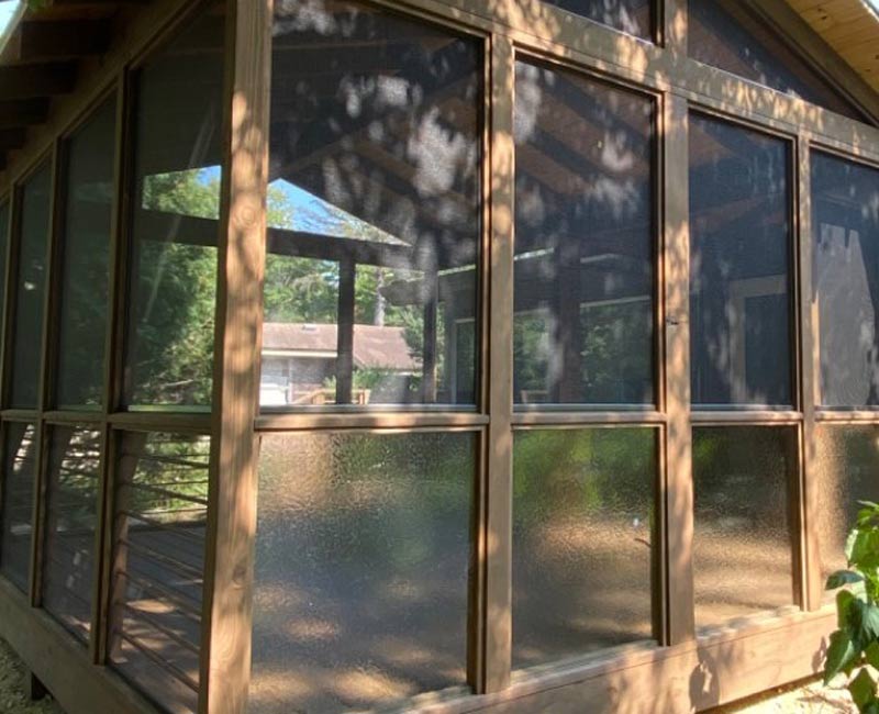 This screen porch addition in Madison, WI, created a spacious and inviting retreat from the mosquitoes.