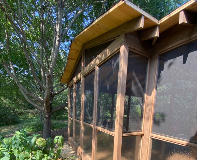 This screen porch addition in Madison, WI, created a spacious and inviting retreat from the mosquitoes.