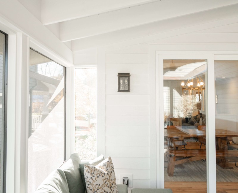See how we remodeled an outdoor deck into a bright, light-filled screened-in porch for this Middleton, WI home. Interior updates helped the porch addition open up the space even more.