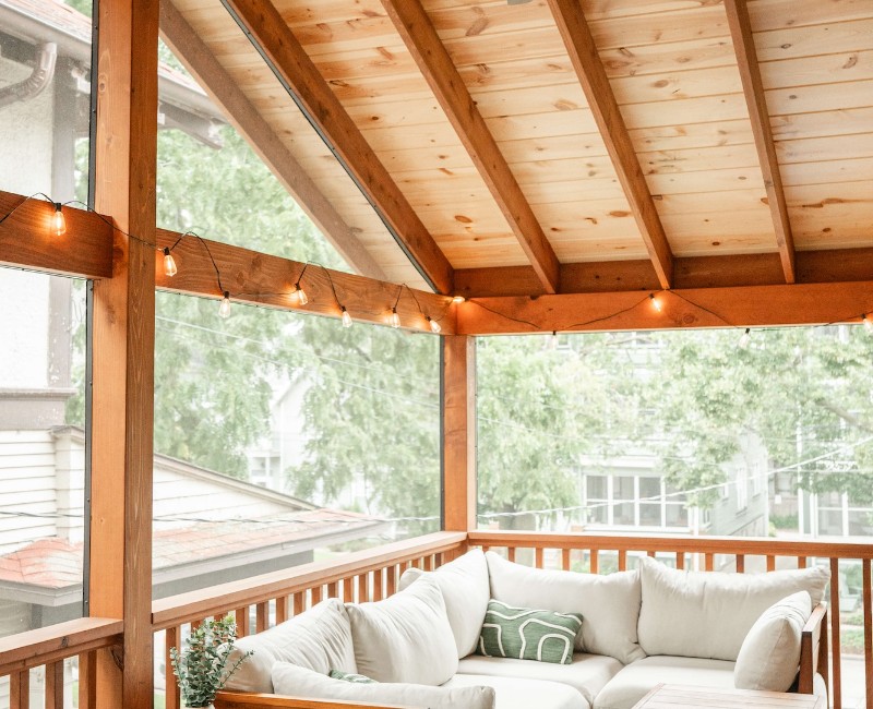 A screened-in porch addition for a historic Madison, WI home. We built a durable screened-in porch for shaded outdoor living; an open, sunny side deck; and a spiral staircase for backyard access. 

