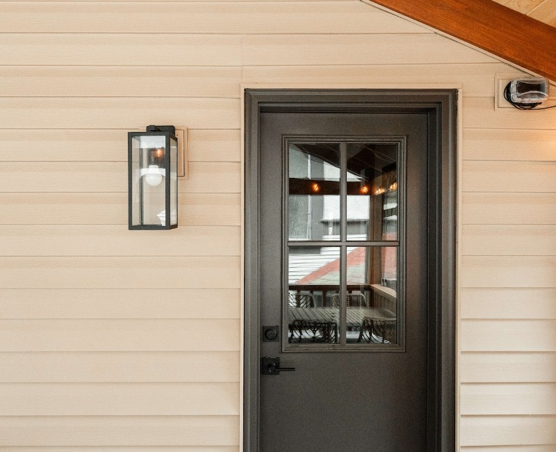 A screened-in porch addition for a historic Madison, WI home. We built a durable screened-in porch for shaded outdoor living; an open, sunny side deck; and a spiral staircase for backyard access. 
