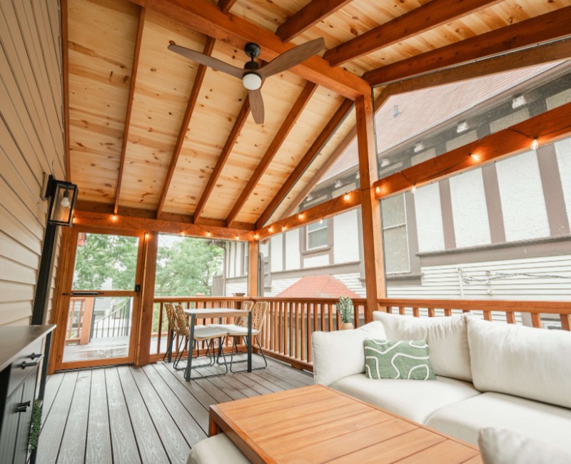 A screened-in porch addition for a historic Madison, WI home. We built a durable screened-in porch for shaded outdoor living; an open, sunny side deck; and a spiral staircase for backyard access. 
