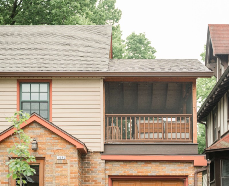A screened-in porch addition for a historic Madison, WI home. We built a durable screened-in porch for shaded outdoor living; an open, sunny side deck; and a spiral staircase for backyard access. 
