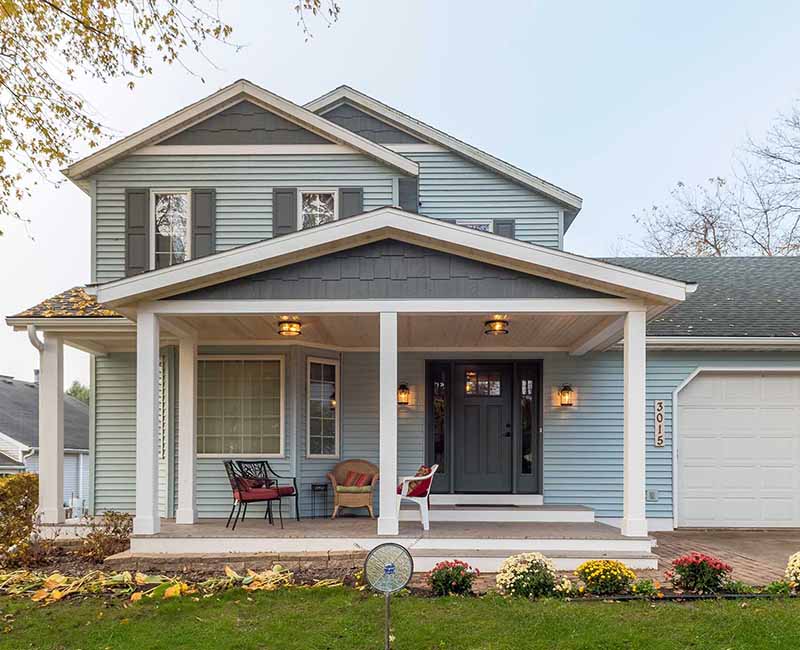 This porch remodel in Middleton, WI, fits right in with the rest of the home’s architecture and provides a stately and welcoming entryway to the home.