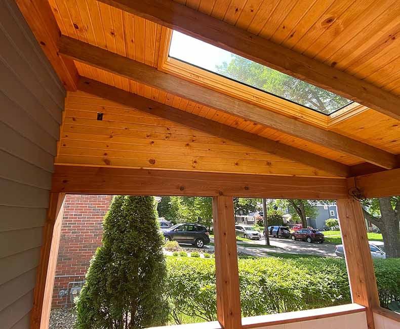 This front porch addition in Madison, WI, created an inviting protected entryway that also provided the homeowners with additional seating space.