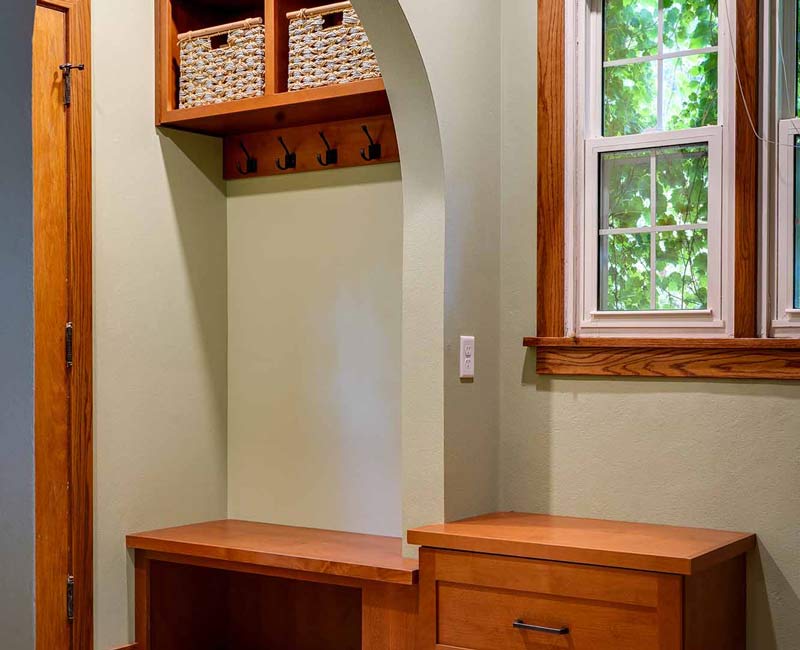 This whole-house remodel in Madison, WI, provided the homeowners with an updated kitchen, dining room, living room, library, entryway, and powder room.