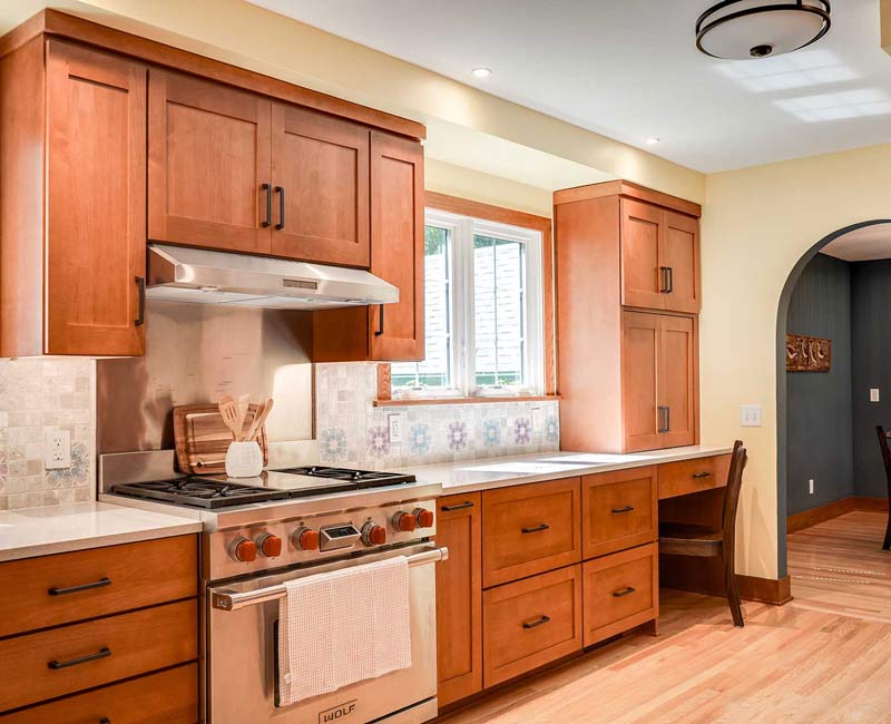 This whole-house remodel in Madison, WI, provided the homeowners with an updated kitchen, dining room, living room, library, entryway, and powder room.