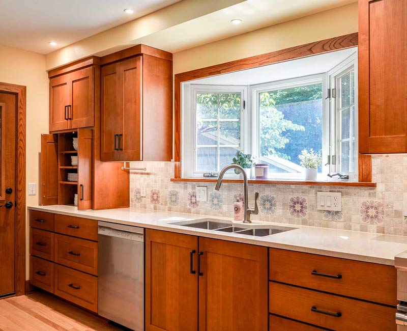This whole-house remodel in Madison, WI, provided the homeowners with an updated kitchen, dining room, living room, library, entryway, and powder room.