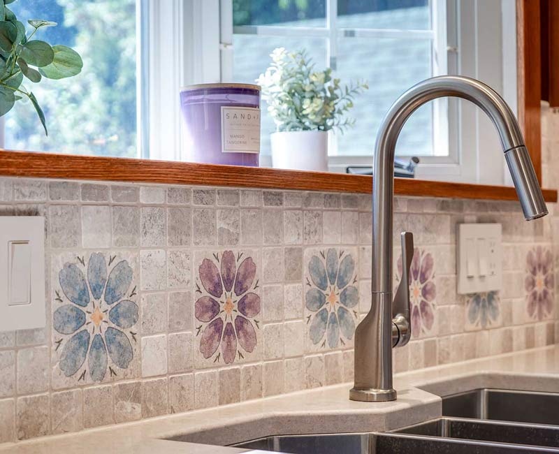 This whole-house remodel in Madison, WI, provided the homeowners with an updated kitchen, dining room, living room, library, entryway, and powder room.