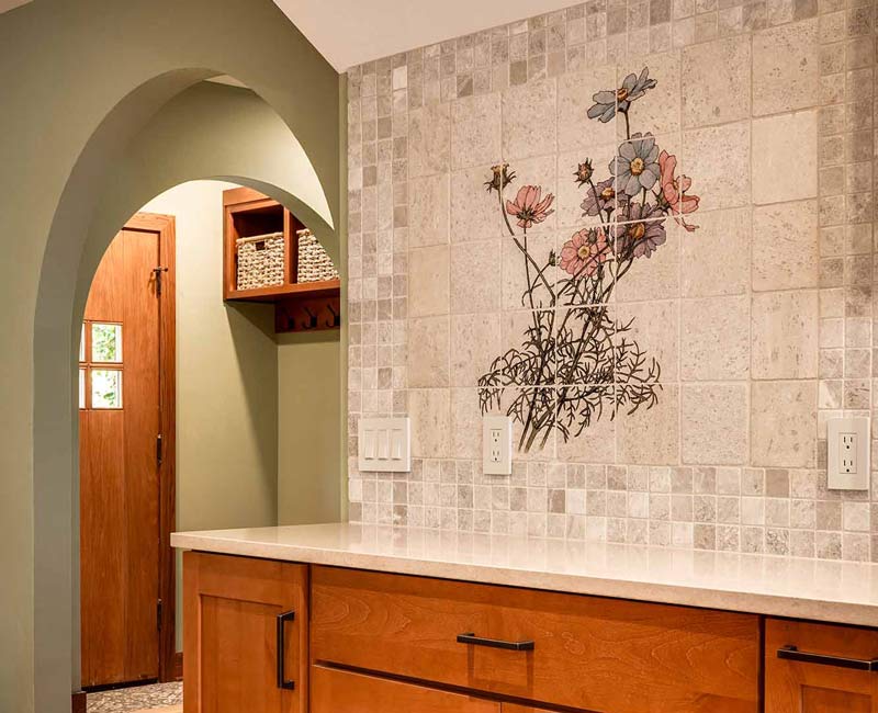 This whole-house remodel in Madison, WI, provided the homeowners with an updated kitchen, dining room, living room, library, entryway, and powder room.