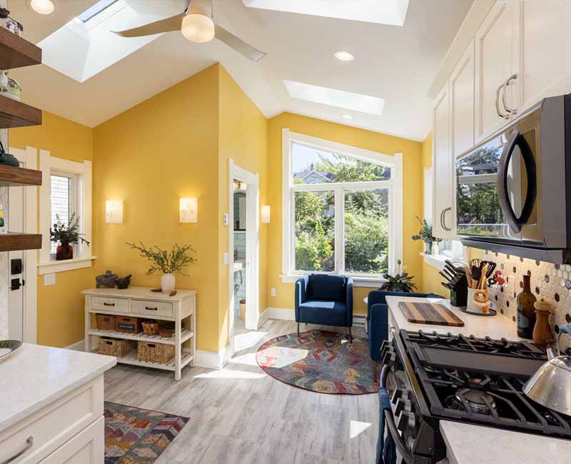 This home addition in Madison, WI features a bright new kitchen with a gluten free zone, because of a family member’s celiac disease, and an accessible bathroom that utilizes universal design and a zero-entry shower.