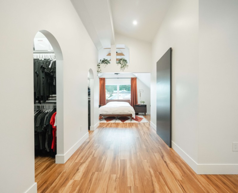 The owners of a 1950s ranch in Madison, WI wanted to transform their unfinished attic into a fully finished second floor with a primary bedroom retreat, ensuite bath, and plenty of closet space.