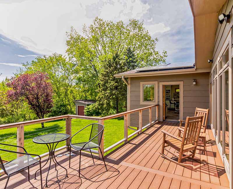 This home addition in Middleton, WI provided the homeowner with a quilting and craft room that has incredible views of the backyard and that opens out onto a fully remodeled deck.