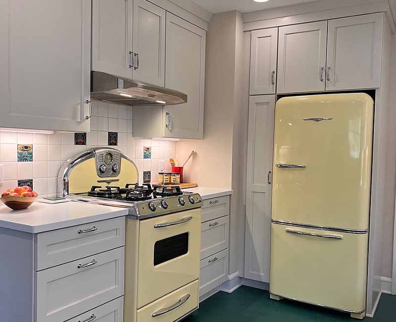 By removing a wall and creating a small addition we were able to give the homeowner a large bright kitchen as well as a full bathroom.