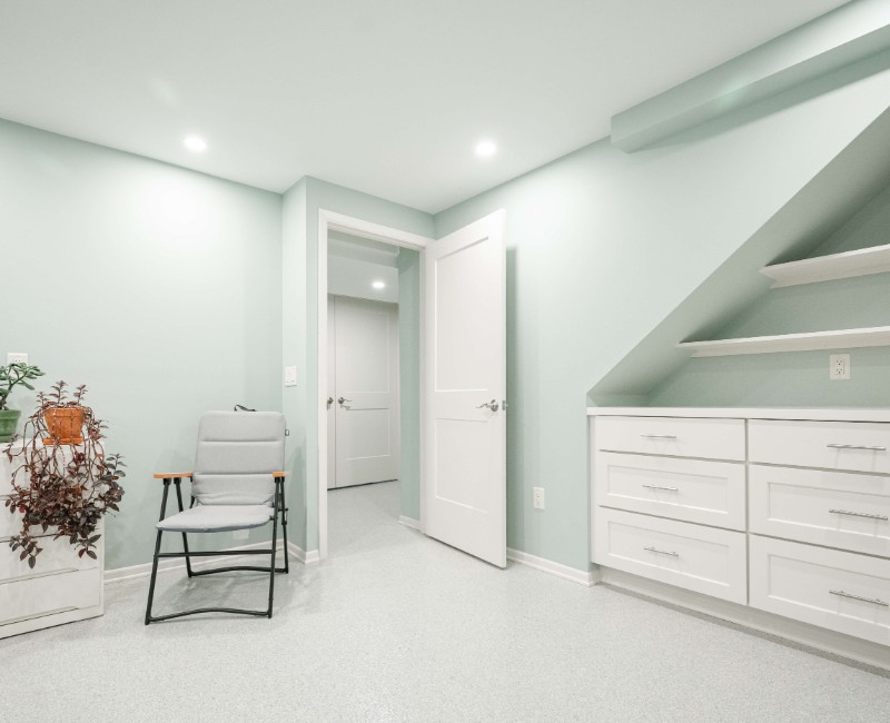 A basement remodel in Madison, WI that transformed an unfinished basement into a rec room, complete with a private full bath. The layout gives the kids a place that’s entirely their own: room to run around, play with toys, and sleep. 